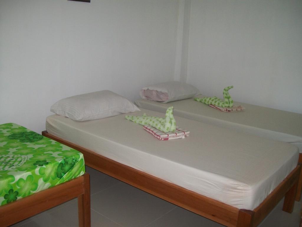 Charm Guest House Puerto Princesa Стая снимка